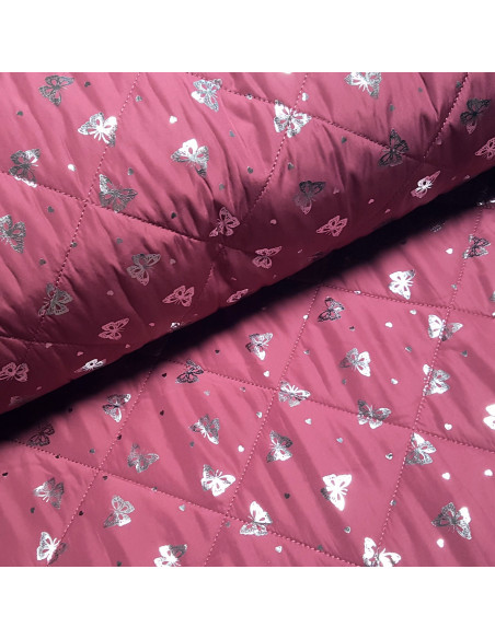 Matelassé papillons argentés, bois de rose