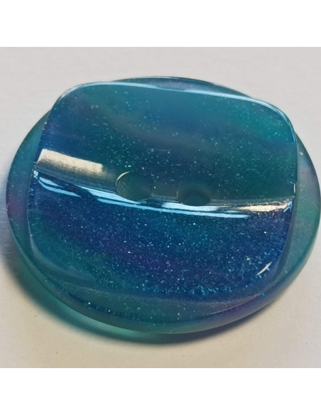 Bouton polyester 2 trous, 21mm, rond avec un carré teinté de bleu à  paillettes, bleu azur clair