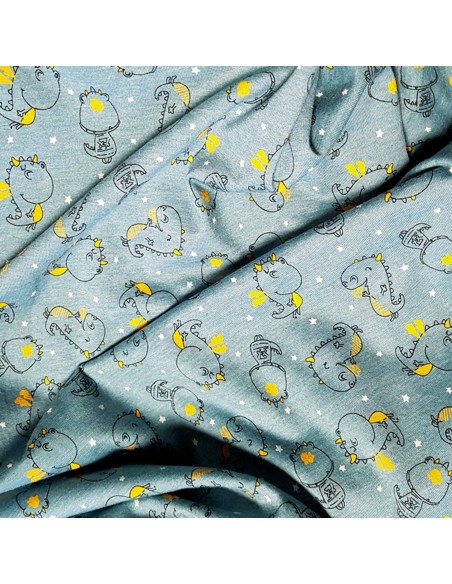Tissu, Jersey de Coton Imprimé Dinosaures, Bleu Gris Chiné, Laize 145 cm, Coton Stretch Oeko-Tex