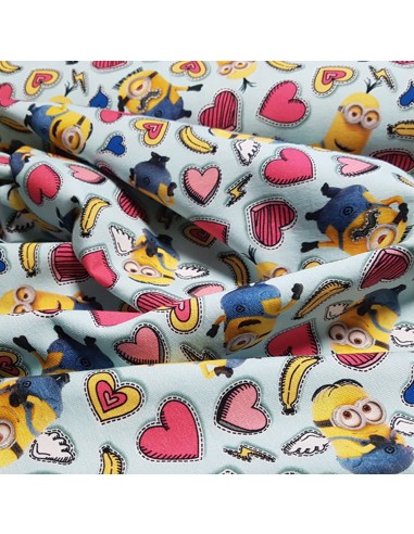 Tissu, Jersey de Coton Imprimé Minions, Minions et Cœurs, Laize 150 cm, Coton Stretch Oeko-Tex