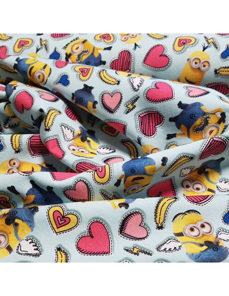 Tissu, Jersey de Coton Imprimé Minions, Minions et Cœurs, Laize 150 cm, Coton Stretch Oeko-Tex